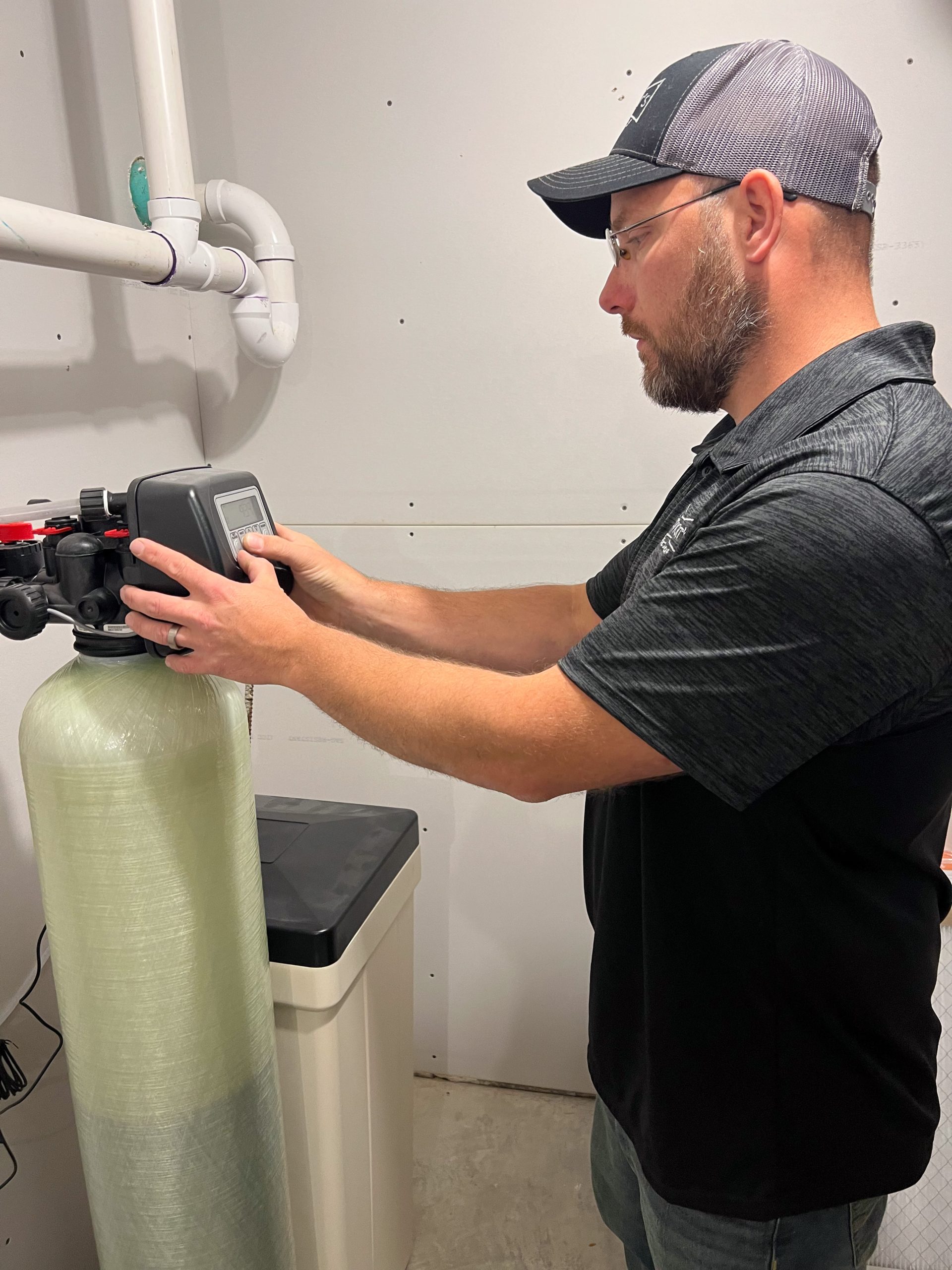 Schwickert's plumber checking water softener