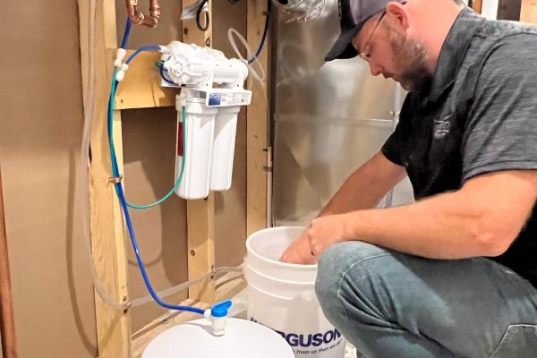 Schwickert's plumber servicing reverse osmosis (RO) system