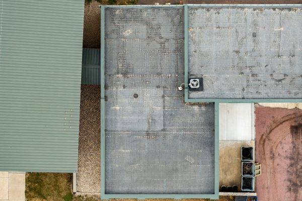 aerial view of l-shaped roof