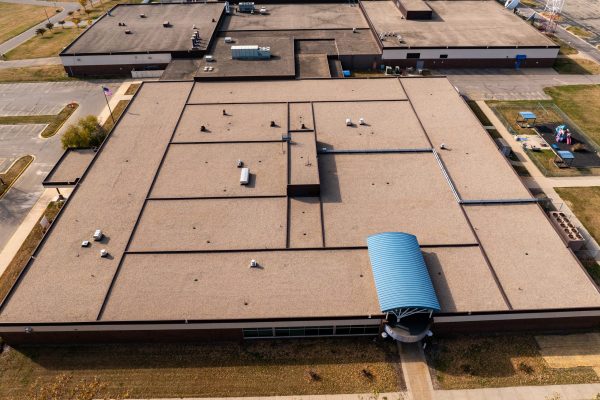 drone of Riverland Community College with teal metal detail